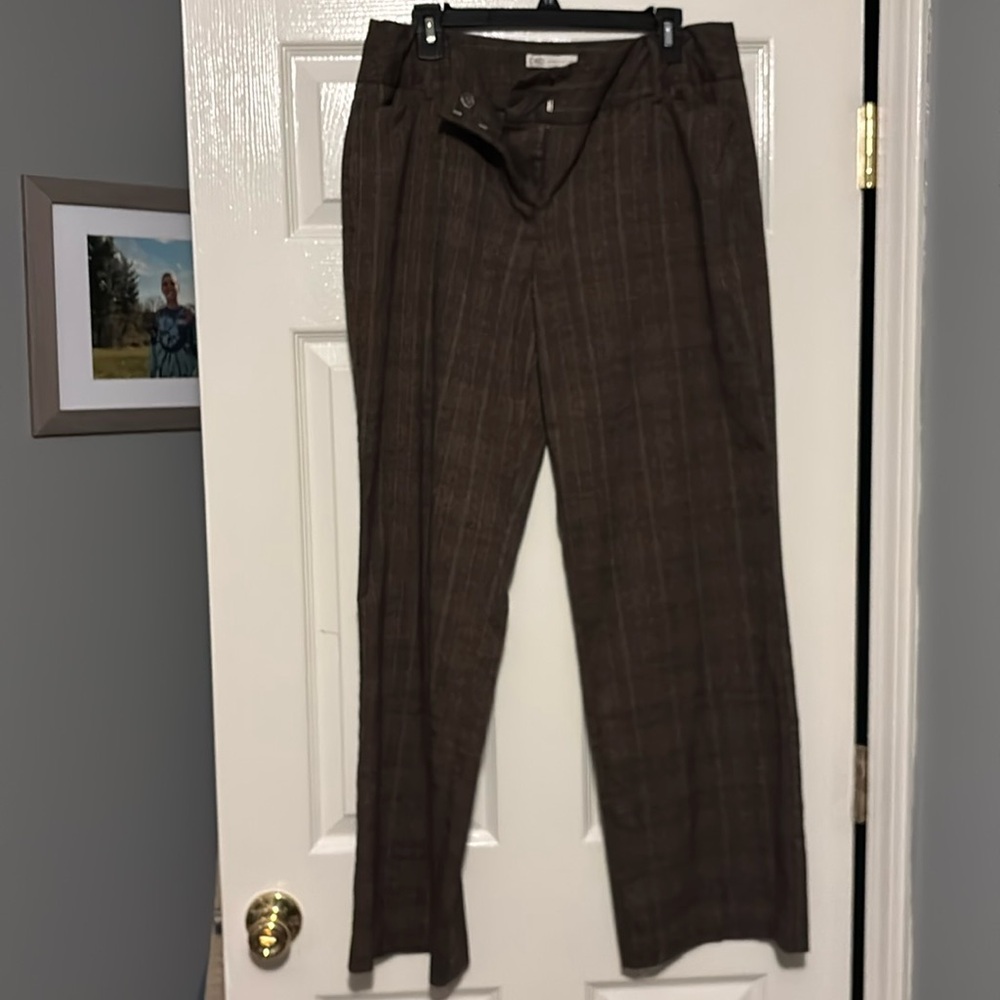 Previously loved brown plaid dress slacks. Polyesterter/spandex blend.